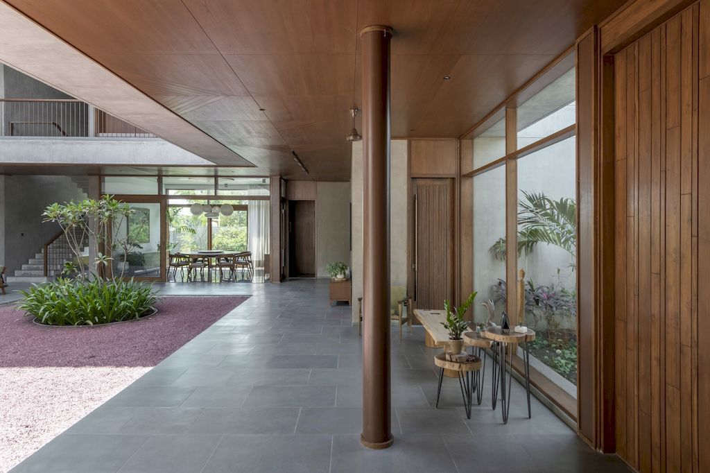 The Monolithic House Features Open & Green Spaces by MODO Designs