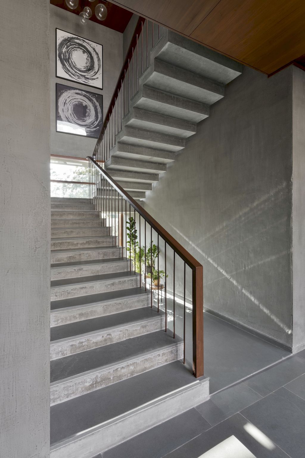 The Monolithic House Features Open & Green Spaces by MODO Designs