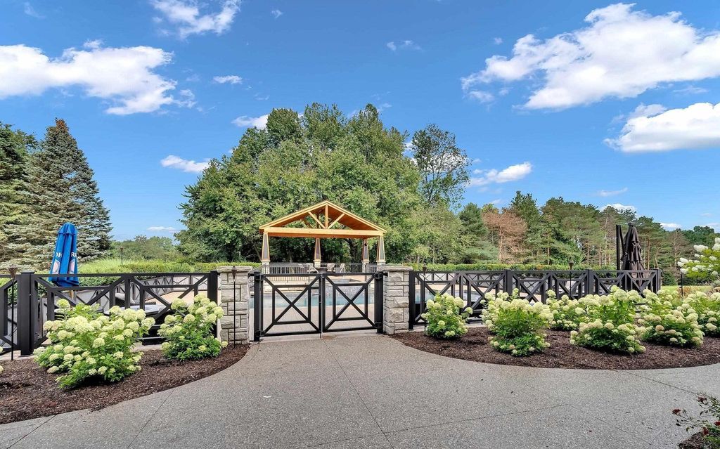 Timeless Elegance Meets Natural Beauty: Custom Ranch Estate in Rochester, Michigan, Listed at $3,999,900