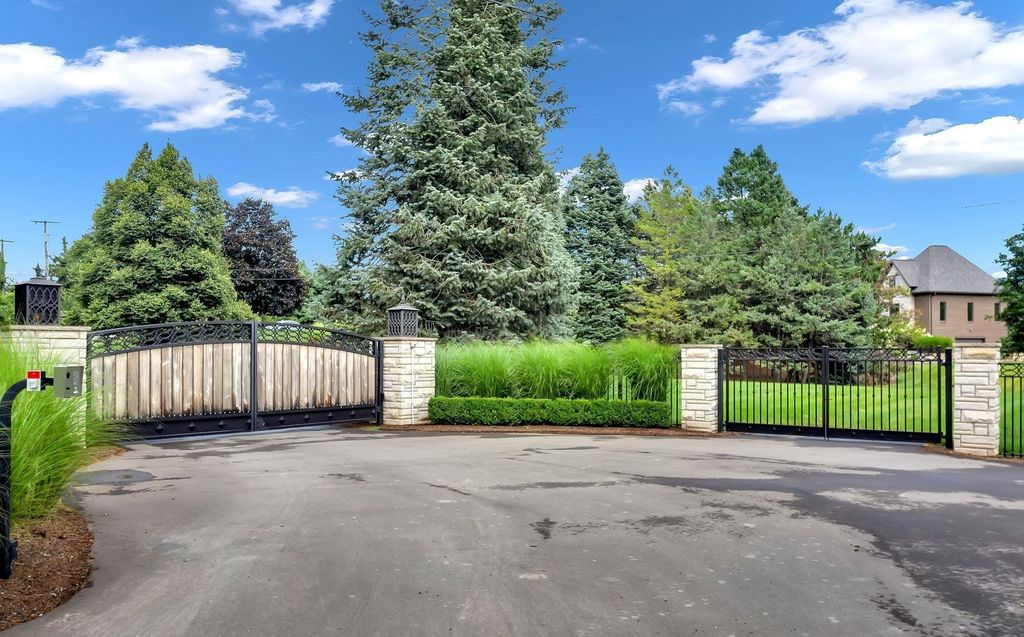 Timeless Elegance Meets Natural Beauty: Custom Ranch Estate in Rochester, Michigan, Listed at $3,999,900