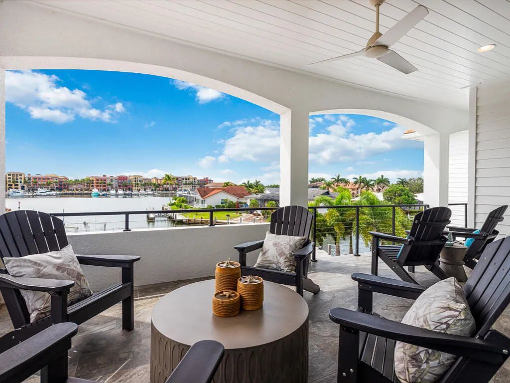 Discover waterfront perfection at 681 Crescent St, Marco Island, FL. This 2020-built, lightly lived-in masterpiece offers 4 bedrooms, 5 baths, and 4,047 square feet of luxury living. Its open split floor plan seamlessly blends indoor and outdoor spaces, revealing breathtaking bay views.