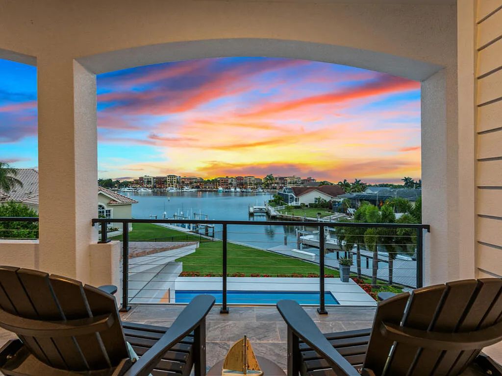 Discover waterfront perfection at 681 Crescent St, Marco Island, FL. This 2020-built, lightly lived-in masterpiece offers 4 bedrooms, 5 baths, and 4,047 square feet of luxury living. Its open split floor plan seamlessly blends indoor and outdoor spaces, revealing breathtaking bay views.