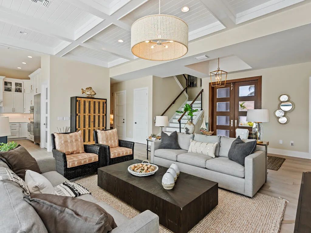 Discover waterfront perfection at 681 Crescent St, Marco Island, FL. This 2020-built, lightly lived-in masterpiece offers 4 bedrooms, 5 baths, and 4,047 square feet of luxury living. Its open split floor plan seamlessly blends indoor and outdoor spaces, revealing breathtaking bay views.