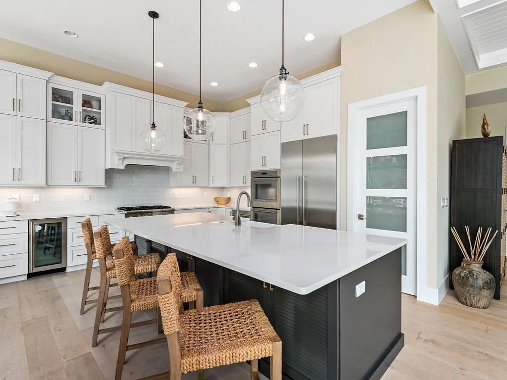 Discover waterfront perfection at 681 Crescent St, Marco Island, FL. This 2020-built, lightly lived-in masterpiece offers 4 bedrooms, 5 baths, and 4,047 square feet of luxury living. Its open split floor plan seamlessly blends indoor and outdoor spaces, revealing breathtaking bay views.
