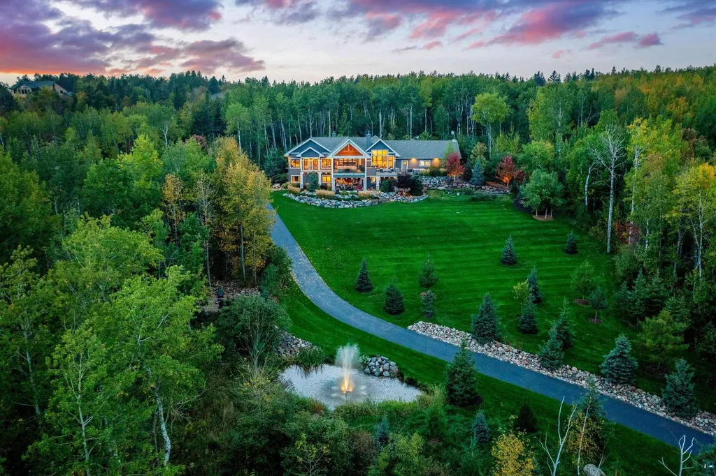 . 123 Montauk Lane Home in Duluth, MinnesotaDiscover your dream home on 3 acres in Duluth with this unique 5+ bedroom, 5 bath custom oasis. Meticulously crafted with imported materials and top-of-the-line features, including lake views from almost every room, a gourmet kitchen, a megardeck addition, and more.
