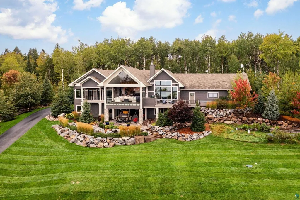 . 123 Montauk Lane Home in Duluth, MinnesotaDiscover your dream home on 3 acres in Duluth with this unique 5+ bedroom, 5 bath custom oasis. Meticulously crafted with imported materials and top-of-the-line features, including lake views from almost every room, a gourmet kitchen, a megardeck addition, and more.