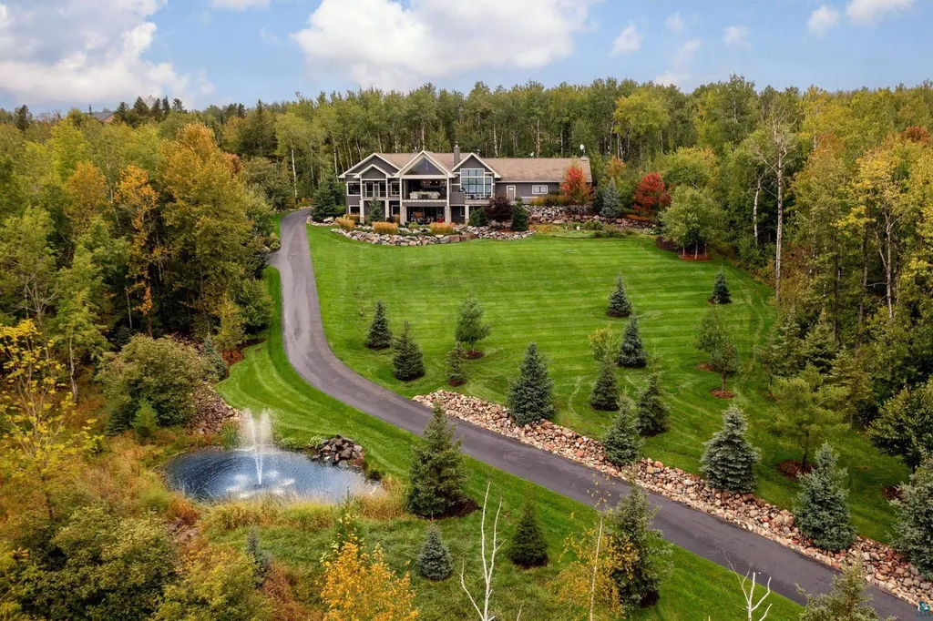 . 123 Montauk Lane Home in Duluth, MinnesotaDiscover your dream home on 3 acres in Duluth with this unique 5+ bedroom, 5 bath custom oasis. Meticulously crafted with imported materials and top-of-the-line features, including lake views from almost every room, a gourmet kitchen, a megardeck addition, and more.