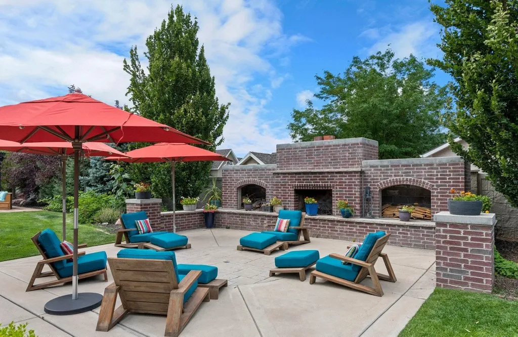 1263 East Chapman Court Home in Alpine, Utah. Step into the lap of luxury in this expansive 13,000 sq ft home in Alpine, Utah. With 8 oversized bedrooms, 6 bathrooms, a 13-car garage, and an outdoor entertainment paradise featuring a pool, spa, and lush landscaping, this property is perfect for hosting and living in grand style.