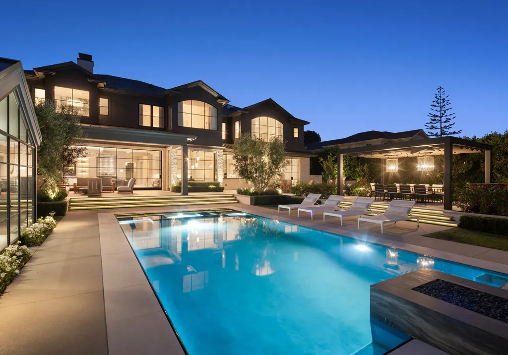 12740 Hanover Street Home in Los Angeles, California. Explore a luxurious and impressive estate in Los Angeles, offering unrivaled panoramic views from downtown to the Pacific Ocean. Floor-to-ceiling automatic glass doors seamlessly blend indoor and outdoor spaces.