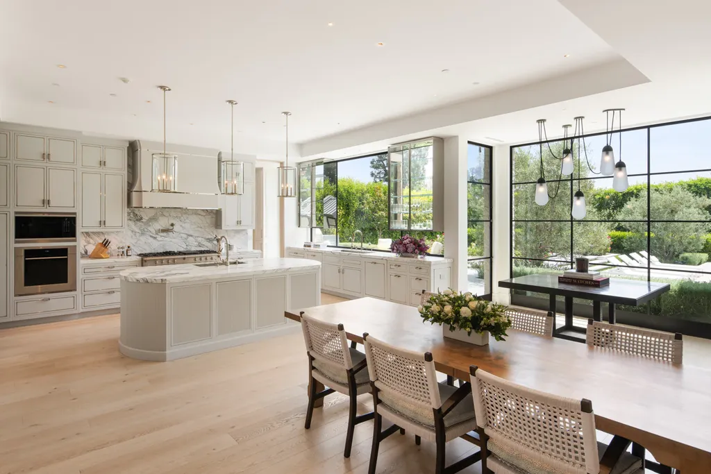 12740 Hanover Street Home in Los Angeles, California. Explore a luxurious and impressive estate in Los Angeles, offering unrivaled panoramic views from downtown to the Pacific Ocean. Floor-to-ceiling automatic glass doors seamlessly blend indoor and outdoor spaces.