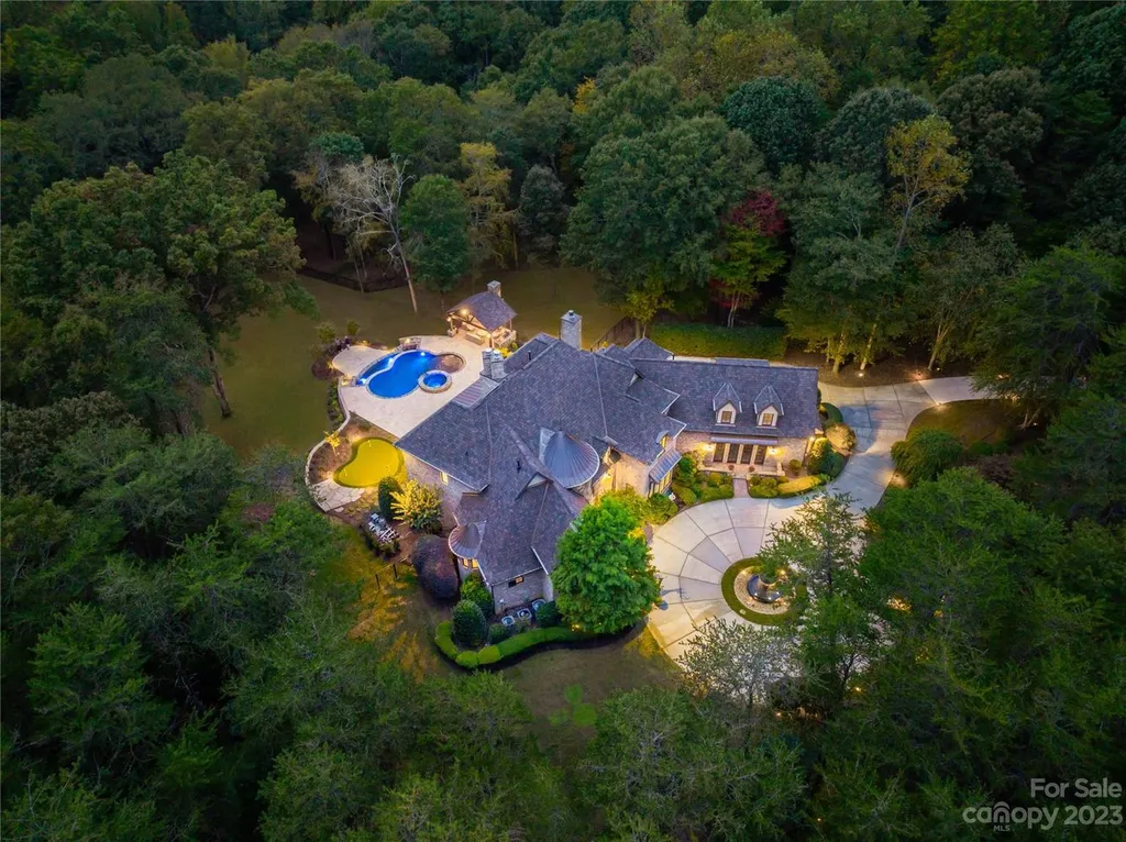 13305 Claysparrow Road Home in Charlotte, North Carolina. Welcome to the epitome of luxury living within the exclusive gates of 13305 Claysparrow Road in The Sanctuary @ Lake Wylie! This immaculately maintained private estate has undergone recent enhancements, including a new roof, AC units, hot water heater, and renovated guest bathrooms.