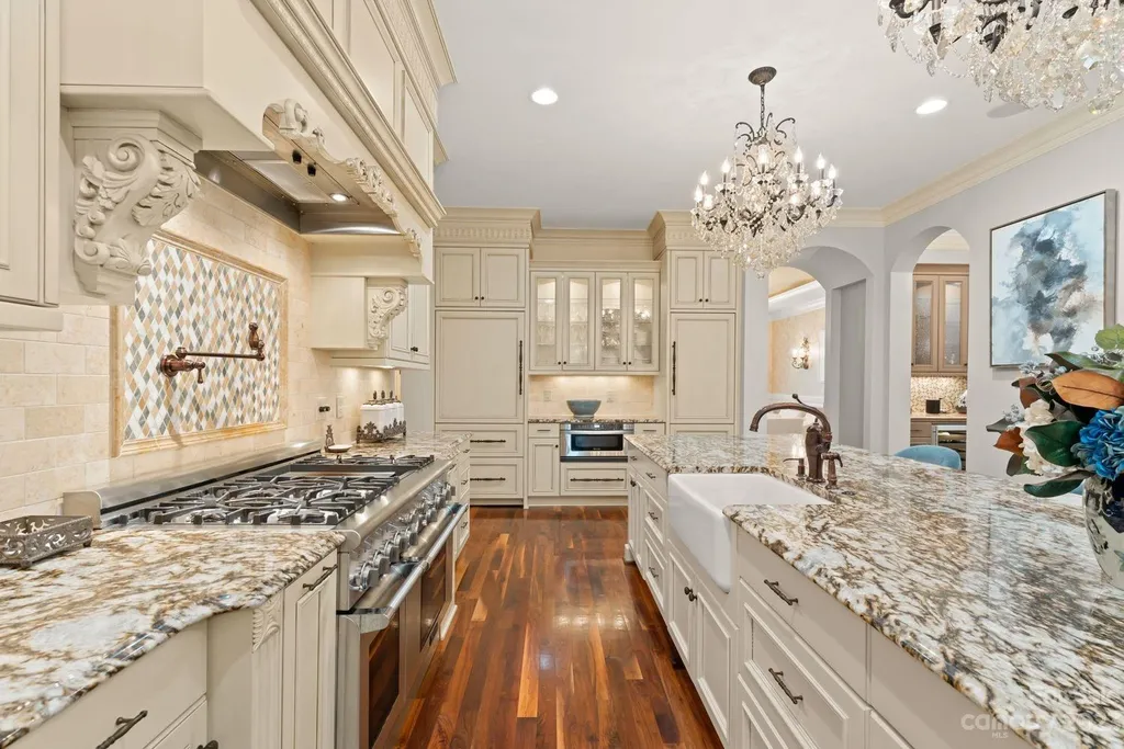13305 Claysparrow Road Home in Charlotte, North Carolina. Welcome to the epitome of luxury living within the exclusive gates of 13305 Claysparrow Road in The Sanctuary @ Lake Wylie! This immaculately maintained private estate has undergone recent enhancements, including a new roof, AC units, hot water heater, and renovated guest bathrooms.