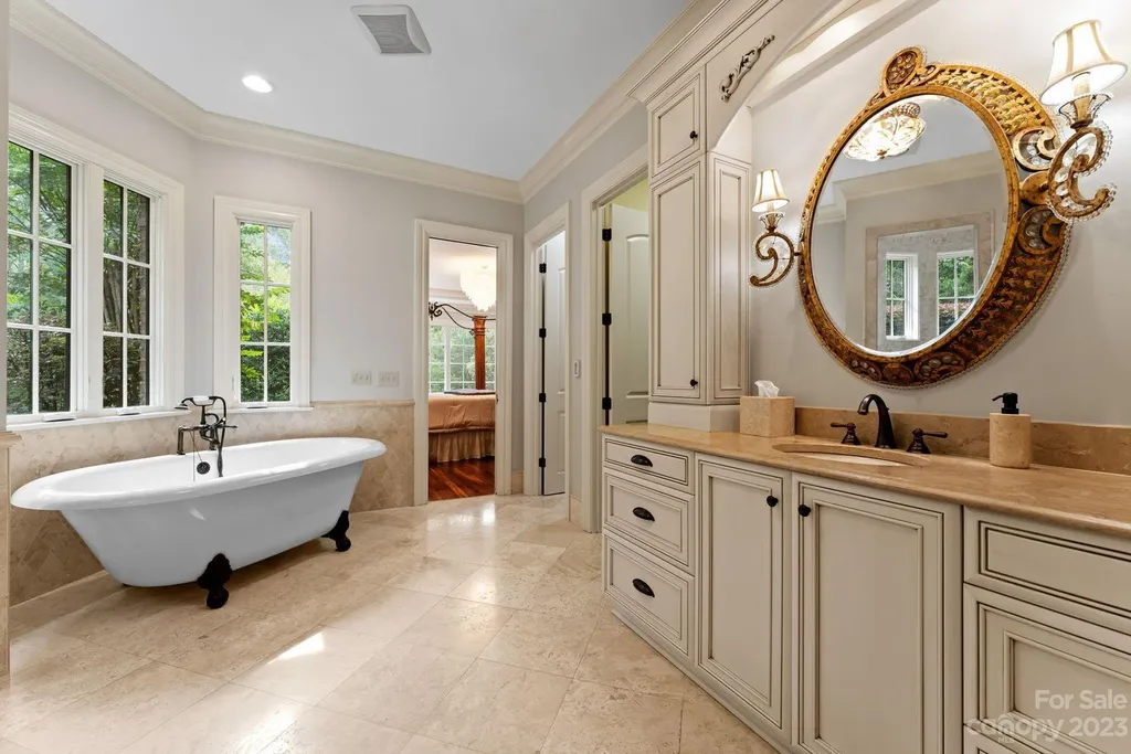 13305 Claysparrow Road Home in Charlotte, North Carolina. Welcome to the epitome of luxury living within the exclusive gates of 13305 Claysparrow Road in The Sanctuary @ Lake Wylie! This immaculately maintained private estate has undergone recent enhancements, including a new roof, AC units, hot water heater, and renovated guest bathrooms.
