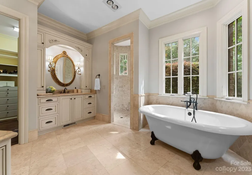 13305 Claysparrow Road Home in Charlotte, North Carolina. Welcome to the epitome of luxury living within the exclusive gates of 13305 Claysparrow Road in The Sanctuary @ Lake Wylie! This immaculately maintained private estate has undergone recent enhancements, including a new roof, AC units, hot water heater, and renovated guest bathrooms.