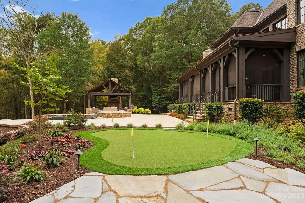 13305 Claysparrow Road Home in Charlotte, North Carolina. Welcome to the epitome of luxury living within the exclusive gates of 13305 Claysparrow Road in The Sanctuary @ Lake Wylie! This immaculately maintained private estate has undergone recent enhancements, including a new roof, AC units, hot water heater, and renovated guest bathrooms.