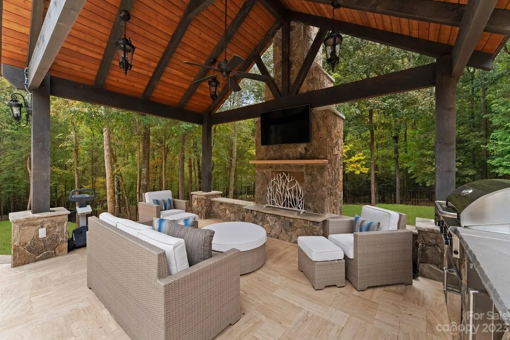 13305 Claysparrow Road Home in Charlotte, North Carolina. Welcome to the epitome of luxury living within the exclusive gates of 13305 Claysparrow Road in The Sanctuary @ Lake Wylie! This immaculately maintained private estate has undergone recent enhancements, including a new roof, AC units, hot water heater, and renovated guest bathrooms.