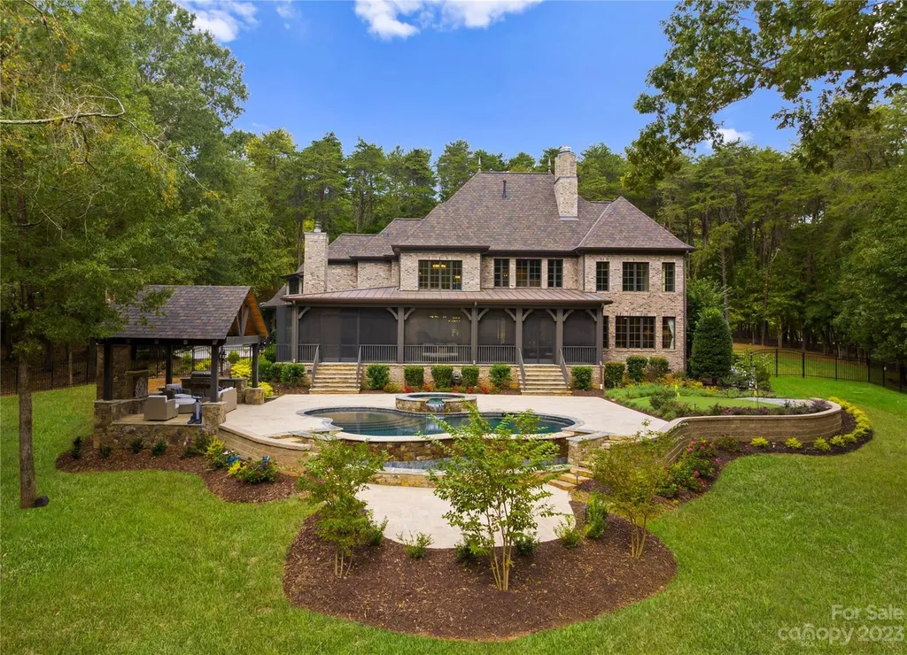 13305 Claysparrow Road Home in Charlotte, North Carolina. Welcome to the epitome of luxury living within the exclusive gates of 13305 Claysparrow Road in The Sanctuary @ Lake Wylie! This immaculately maintained private estate has undergone recent enhancements, including a new roof, AC units, hot water heater, and renovated guest bathrooms.