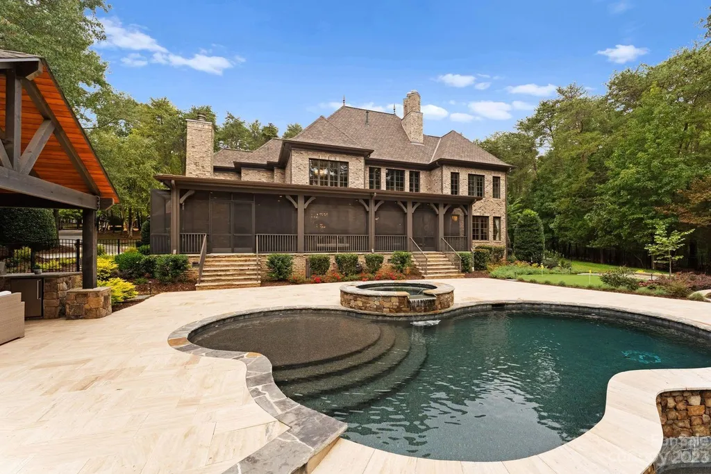 13305 Claysparrow Road Home in Charlotte, North Carolina. Welcome to the epitome of luxury living within the exclusive gates of 13305 Claysparrow Road in The Sanctuary @ Lake Wylie! This immaculately maintained private estate has undergone recent enhancements, including a new roof, AC units, hot water heater, and renovated guest bathrooms.