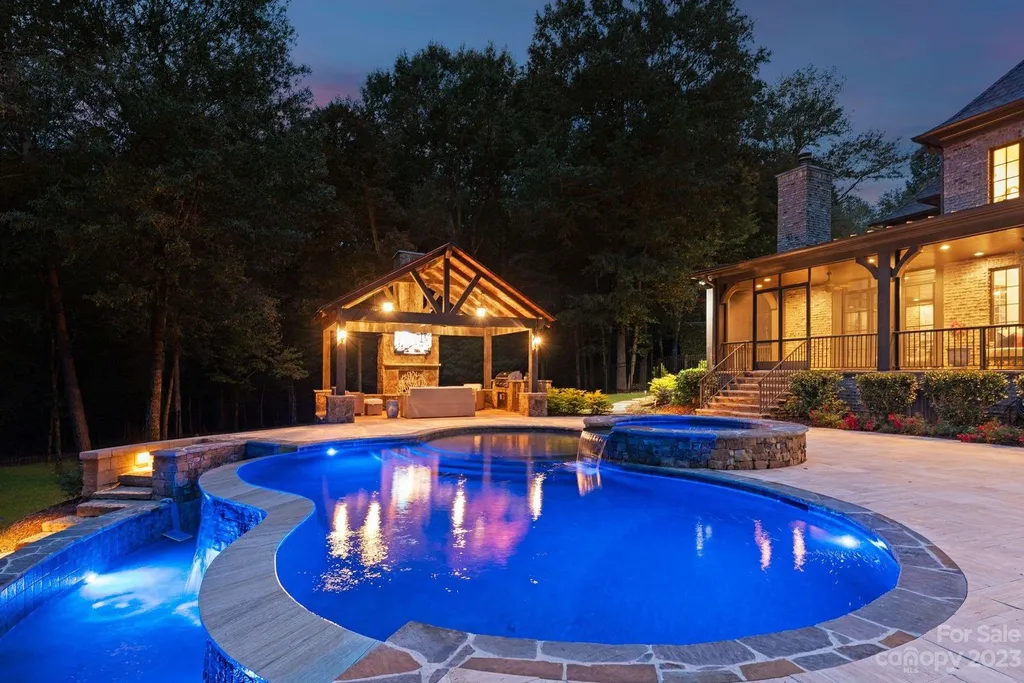 13305 Claysparrow Road Home in Charlotte, North Carolina. Welcome to the epitome of luxury living within the exclusive gates of 13305 Claysparrow Road in The Sanctuary @ Lake Wylie! This immaculately maintained private estate has undergone recent enhancements, including a new roof, AC units, hot water heater, and renovated guest bathrooms.