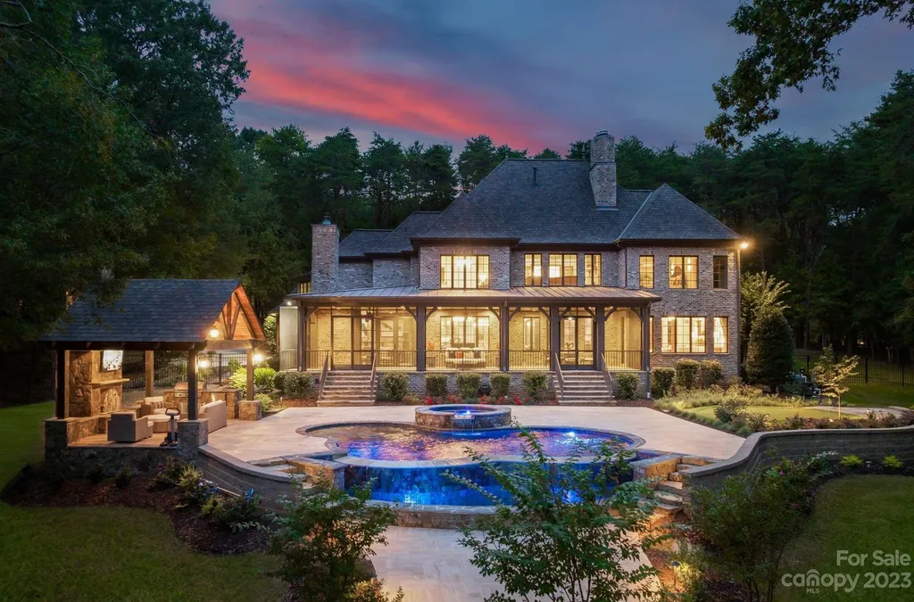 13305 Claysparrow Road Home in Charlotte, North Carolina. Welcome to the epitome of luxury living within the exclusive gates of 13305 Claysparrow Road in The Sanctuary @ Lake Wylie! This immaculately maintained private estate has undergone recent enhancements, including a new roof, AC units, hot water heater, and renovated guest bathrooms.