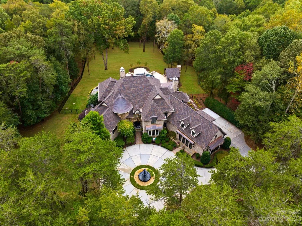 13305 Claysparrow Road Home in Charlotte, North Carolina. Welcome to the epitome of luxury living within the exclusive gates of 13305 Claysparrow Road in The Sanctuary @ Lake Wylie! This immaculately maintained private estate has undergone recent enhancements, including a new roof, AC units, hot water heater, and renovated guest bathrooms.