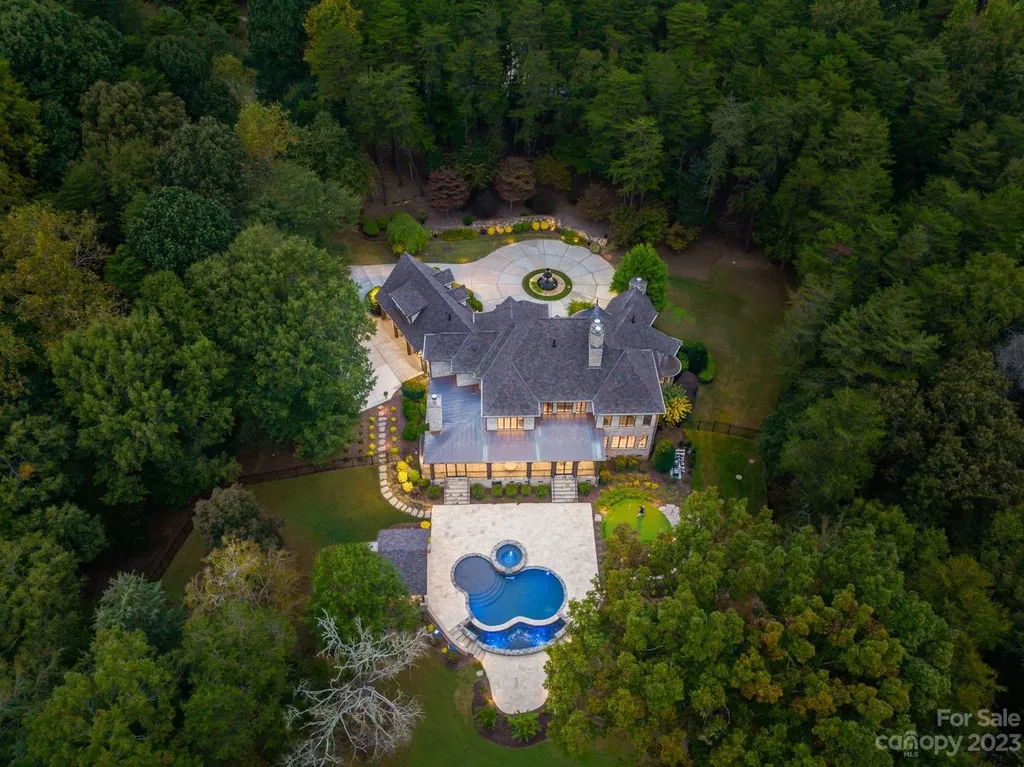13305 Claysparrow Road Home in Charlotte, North Carolina. Welcome to the epitome of luxury living within the exclusive gates of 13305 Claysparrow Road in The Sanctuary @ Lake Wylie! This immaculately maintained private estate has undergone recent enhancements, including a new roof, AC units, hot water heater, and renovated guest bathrooms.