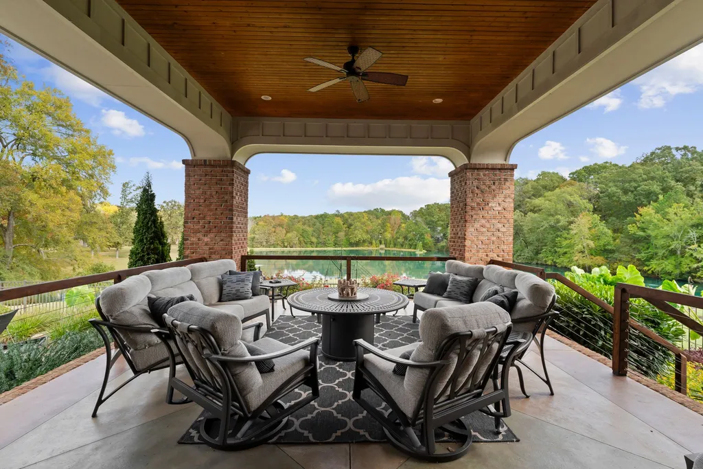 13500 Cabarrus Station Road Home in Midland, North Carolina. Experience the epitome of country living at Clover Lake, an architecturally designed estate on over 30 acres of rolling pastures, serene ponds, and private outdoor spaces just 35 minutes from Uptown Charlotte. This exceptional property features a 3-car garage, gated entry, gourmet kitchen, spacious bedrooms with en-suite baths, and a 4-stall horse barn with a shop, tack room, and office.