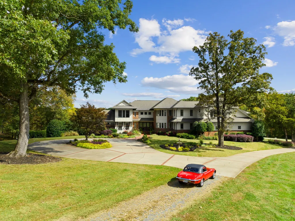 13500 Cabarrus Station Road Home in Midland, North Carolina. Experience the epitome of country living at Clover Lake, an architecturally designed estate on over 30 acres of rolling pastures, serene ponds, and private outdoor spaces just 35 minutes from Uptown Charlotte. This exceptional property features a 3-car garage, gated entry, gourmet kitchen, spacious bedrooms with en-suite baths, and a 4-stall horse barn with a shop, tack room, and office.