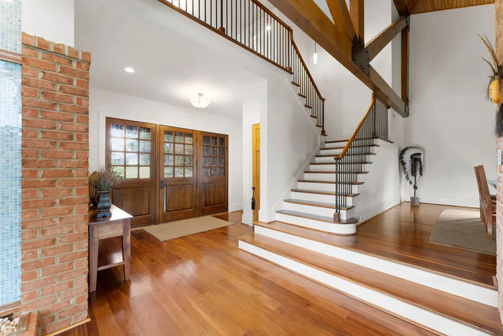 13500 Cabarrus Station Road Home in Midland, North Carolina. Experience the epitome of country living at Clover Lake, an architecturally designed estate on over 30 acres of rolling pastures, serene ponds, and private outdoor spaces just 35 minutes from Uptown Charlotte. This exceptional property features a 3-car garage, gated entry, gourmet kitchen, spacious bedrooms with en-suite baths, and a 4-stall horse barn with a shop, tack room, and office.