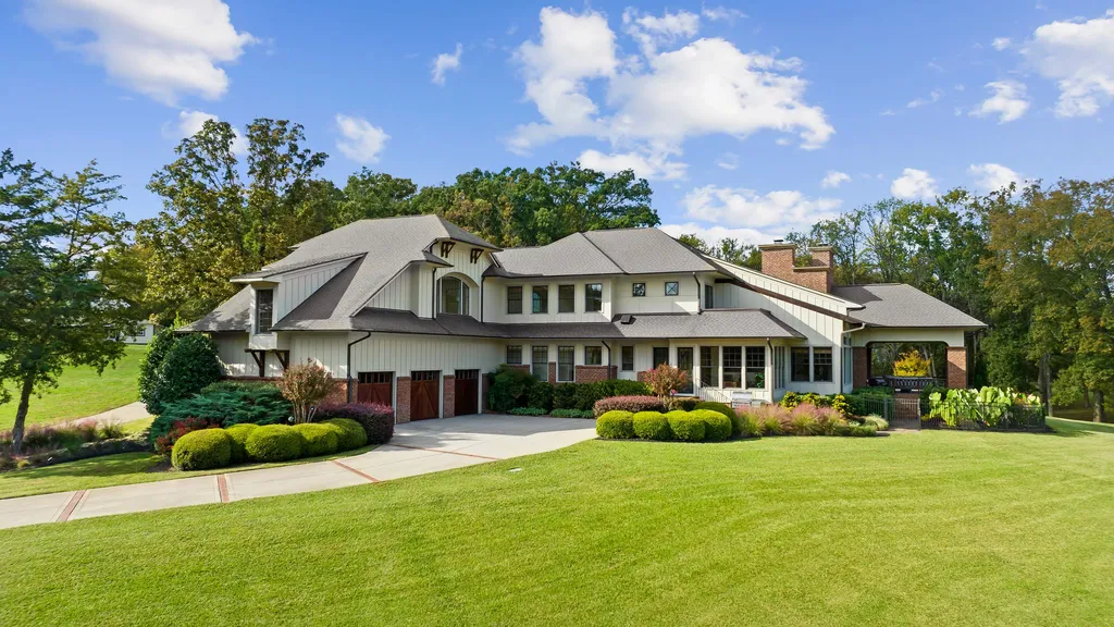 13500 Cabarrus Station Road Home in Midland, North Carolina. Experience the epitome of country living at Clover Lake, an architecturally designed estate on over 30 acres of rolling pastures, serene ponds, and private outdoor spaces just 35 minutes from Uptown Charlotte. This exceptional property features a 3-car garage, gated entry, gourmet kitchen, spacious bedrooms with en-suite baths, and a 4-stall horse barn with a shop, tack room, and office.