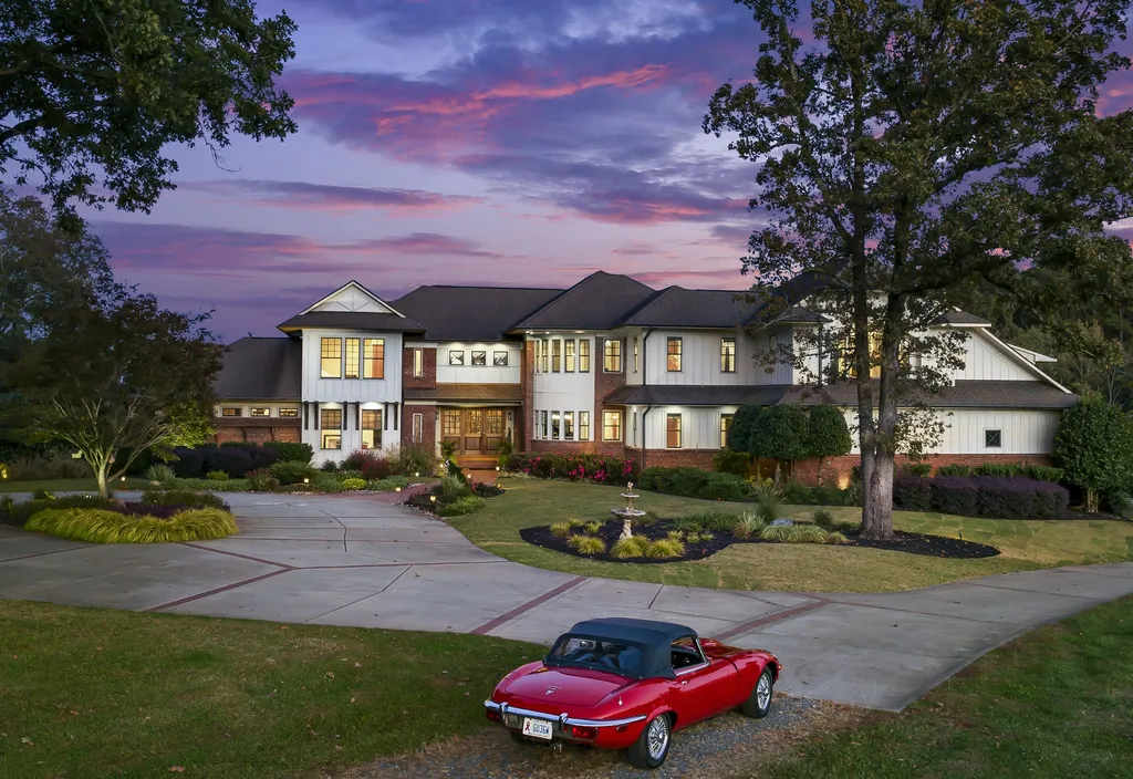 13500 Cabarrus Station Road Home in Midland, North Carolina. Experience the epitome of country living at Clover Lake, an architecturally designed estate on over 30 acres of rolling pastures, serene ponds, and private outdoor spaces just 35 minutes from Uptown Charlotte. This exceptional property features a 3-car garage, gated entry, gourmet kitchen, spacious bedrooms with en-suite baths, and a 4-stall horse barn with a shop, tack room, and office.