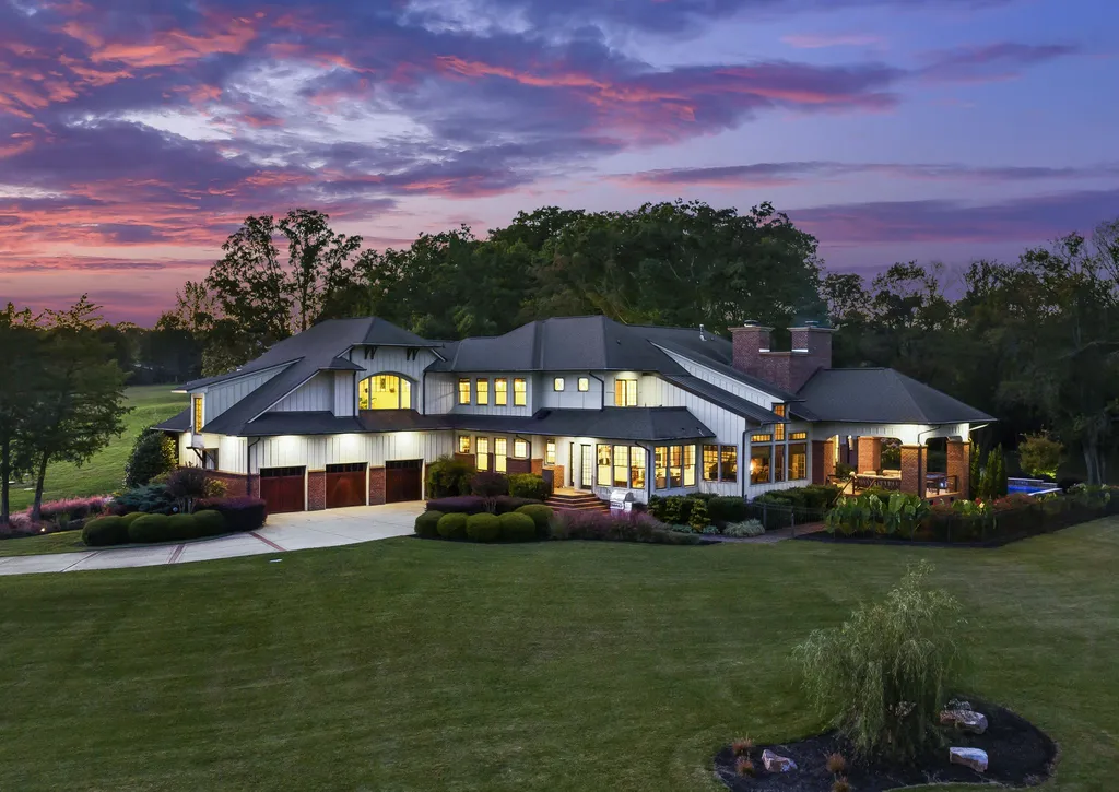 13500 Cabarrus Station Road Home in Midland, North Carolina. Experience the epitome of country living at Clover Lake, an architecturally designed estate on over 30 acres of rolling pastures, serene ponds, and private outdoor spaces just 35 minutes from Uptown Charlotte. This exceptional property features a 3-car garage, gated entry, gourmet kitchen, spacious bedrooms with en-suite baths, and a 4-stall horse barn with a shop, tack room, and office.