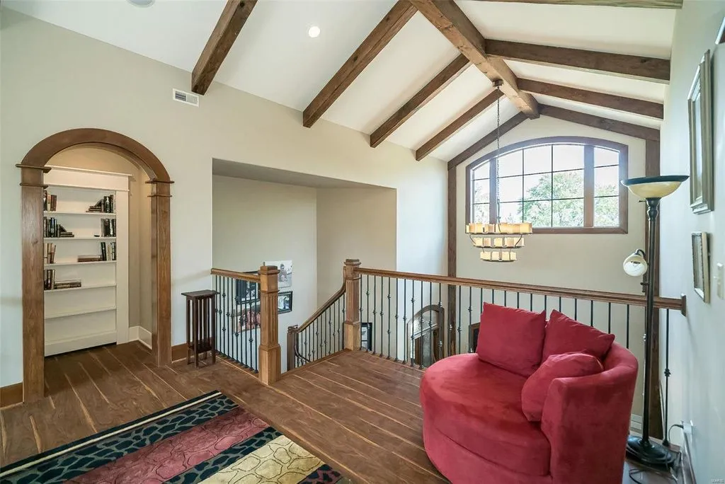 1377 South Mason Road Home in Saint Louis, Missouri. Discover this remarkable 3.3-acre estate bordering Queeny Park, boasting an array of extraordinary outdoor amenities and unmatched privacy. With a massive 2-story foyer, designer kitchen, primary suite with a see-through fireplace, and a sprawling lower level featuring a rec room, theatre, gym, and more. 