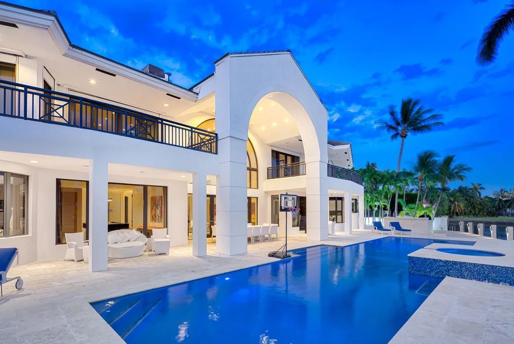 Experience unparalleled luxury in this 7-bedroom, 7-bathroom Golden Beach estate, situated on a 0.41-acre lot with 190 feet of prime waterfront. Renovated to perfection, this contemporary retreat boasts double-height ceilings, a chef's kitchen, a grand master suite, an oversized pool, summer kitchen, and a fully equipped 50-foot dock.