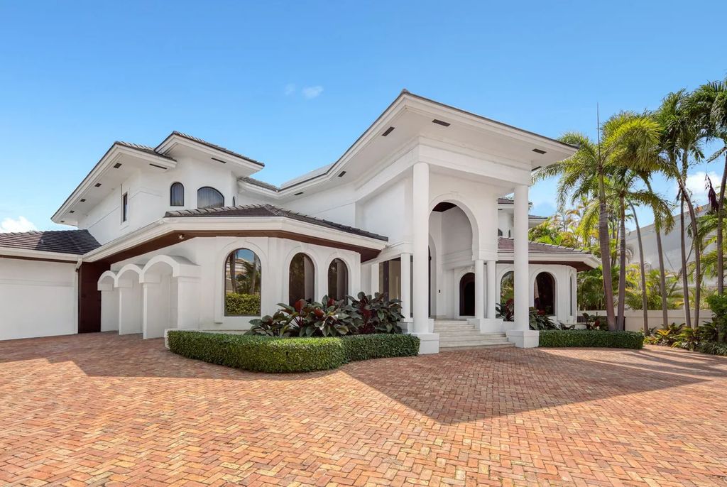Experience unparalleled luxury in this 7-bedroom, 7-bathroom Golden Beach estate, situated on a 0.41-acre lot with 190 feet of prime waterfront. Renovated to perfection, this contemporary retreat boasts double-height ceilings, a chef's kitchen, a grand master suite, an oversized pool, summer kitchen, and a fully equipped 50-foot dock.
