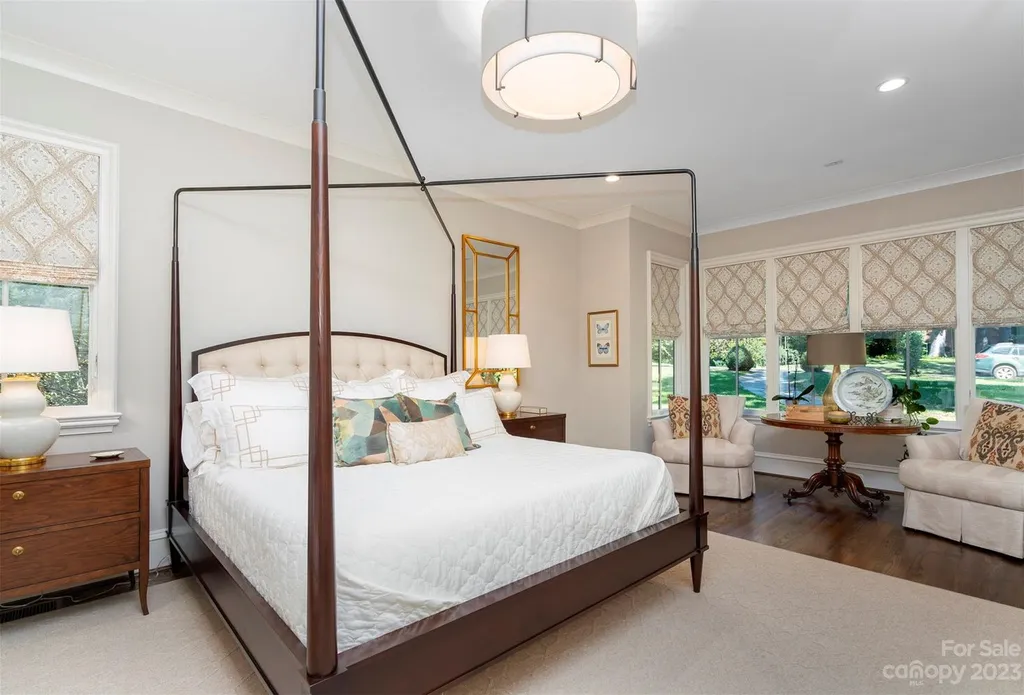 2215 Cortelyou Road Home in Charlotte, North Carolina. Discover the epitome of luxury living in this South Park masterpiece featuring 6 spacious bedrooms, 5 full and 2 half bathrooms, and exquisite craftsmanship throughout. Chef's dream kitchen, a stunning primary suite, media room, sauna, and resort-style outdoor amenities, including a custom pool and outdoor kitchen.