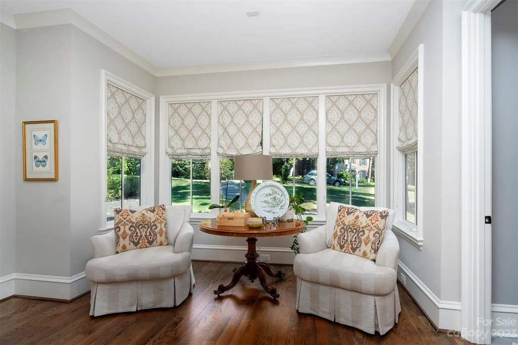 2215 Cortelyou Road Home in Charlotte, North Carolina. Discover the epitome of luxury living in this South Park masterpiece featuring 6 spacious bedrooms, 5 full and 2 half bathrooms, and exquisite craftsmanship throughout. Chef's dream kitchen, a stunning primary suite, media room, sauna, and resort-style outdoor amenities, including a custom pool and outdoor kitchen.
