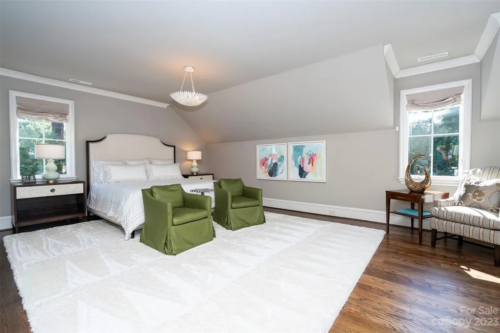 2215 Cortelyou Road Home in Charlotte, North Carolina. Discover the epitome of luxury living in this South Park masterpiece featuring 6 spacious bedrooms, 5 full and 2 half bathrooms, and exquisite craftsmanship throughout. Chef's dream kitchen, a stunning primary suite, media room, sauna, and resort-style outdoor amenities, including a custom pool and outdoor kitchen.