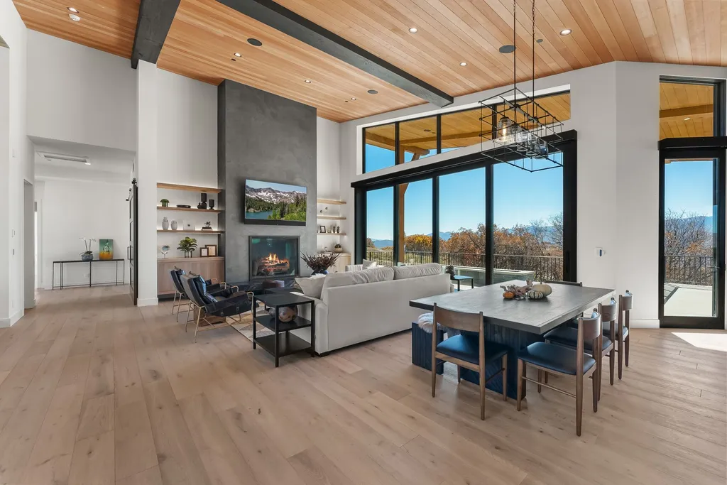 2409 Preserve Drive Home in Park City, Utah. Discover this stunning 6-bedroom, 8-bathroom, 9,196 sq. ft. contemporary home in The Preserve, a premier gated community. Perched on 9.07 acres at the mountain's summit, the home offers breathtaking 280-degree views of ski areas, the Olympic Park, and Salt Lake City.