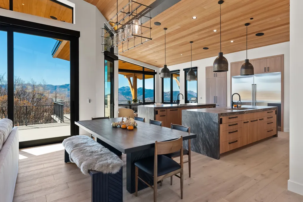 2409 Preserve Drive Home in Park City, Utah. Discover this stunning 6-bedroom, 8-bathroom, 9,196 sq. ft. contemporary home in The Preserve, a premier gated community. Perched on 9.07 acres at the mountain's summit, the home offers breathtaking 280-degree views of ski areas, the Olympic Park, and Salt Lake City.