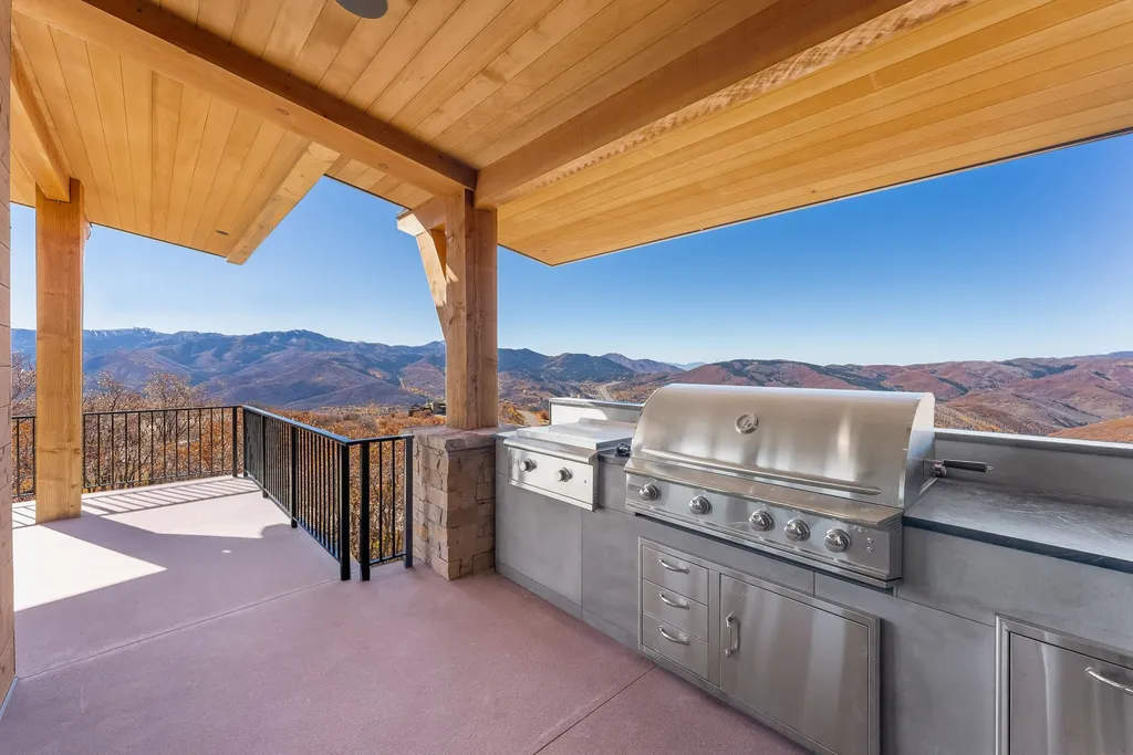 2409 Preserve Drive Home in Park City, Utah. Discover this stunning 6-bedroom, 8-bathroom, 9,196 sq. ft. contemporary home in The Preserve, a premier gated community. Perched on 9.07 acres at the mountain's summit, the home offers breathtaking 280-degree views of ski areas, the Olympic Park, and Salt Lake City.
