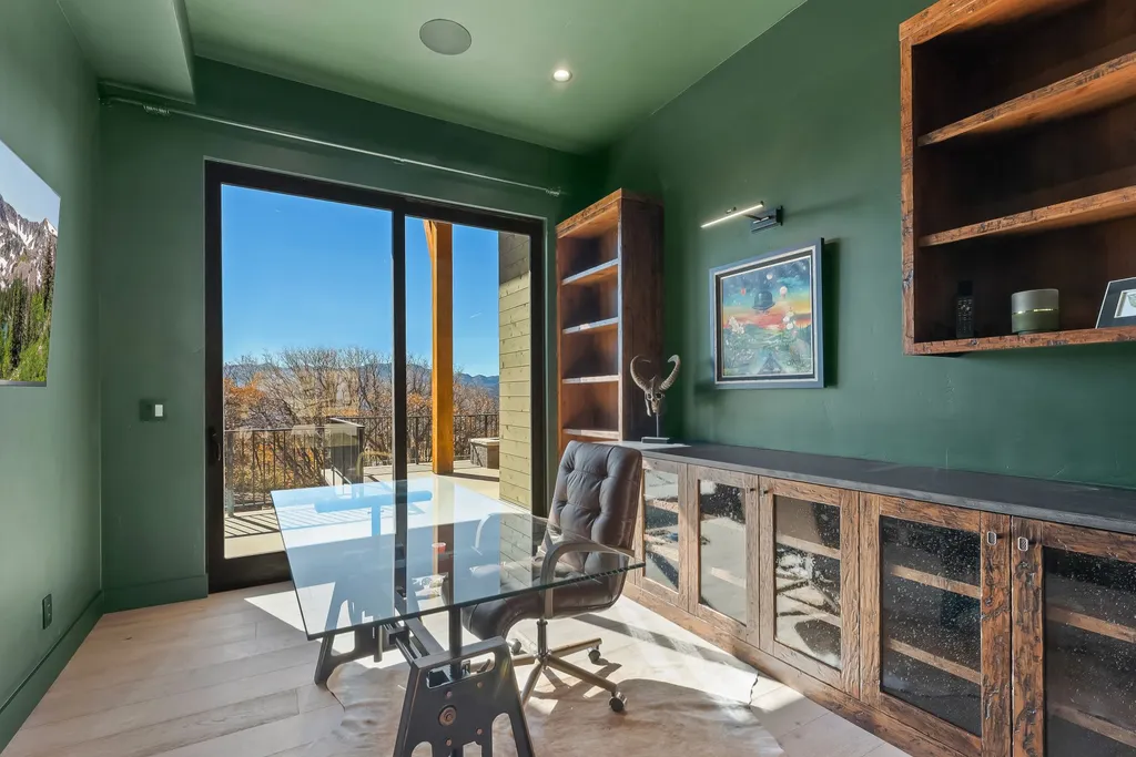 2409 Preserve Drive Home in Park City, Utah. Discover this stunning 6-bedroom, 8-bathroom, 9,196 sq. ft. contemporary home in The Preserve, a premier gated community. Perched on 9.07 acres at the mountain's summit, the home offers breathtaking 280-degree views of ski areas, the Olympic Park, and Salt Lake City.