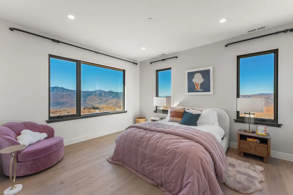 2409 Preserve Drive Home in Park City, Utah. Discover this stunning 6-bedroom, 8-bathroom, 9,196 sq. ft. contemporary home in The Preserve, a premier gated community. Perched on 9.07 acres at the mountain's summit, the home offers breathtaking 280-degree views of ski areas, the Olympic Park, and Salt Lake City.