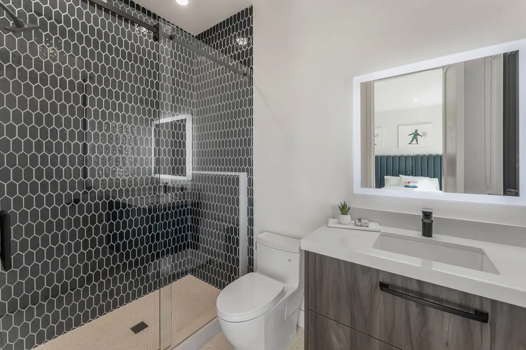 2409 Preserve Drive Home in Park City, Utah. Discover this stunning 6-bedroom, 8-bathroom, 9,196 sq. ft. contemporary home in The Preserve, a premier gated community. Perched on 9.07 acres at the mountain's summit, the home offers breathtaking 280-degree views of ski areas, the Olympic Park, and Salt Lake City.