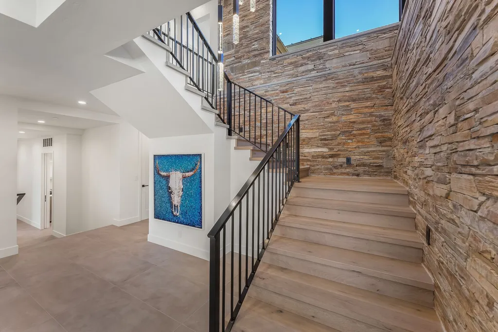 2409 Preserve Drive Home in Park City, Utah. Discover this stunning 6-bedroom, 8-bathroom, 9,196 sq. ft. contemporary home in The Preserve, a premier gated community. Perched on 9.07 acres at the mountain's summit, the home offers breathtaking 280-degree views of ski areas, the Olympic Park, and Salt Lake City.