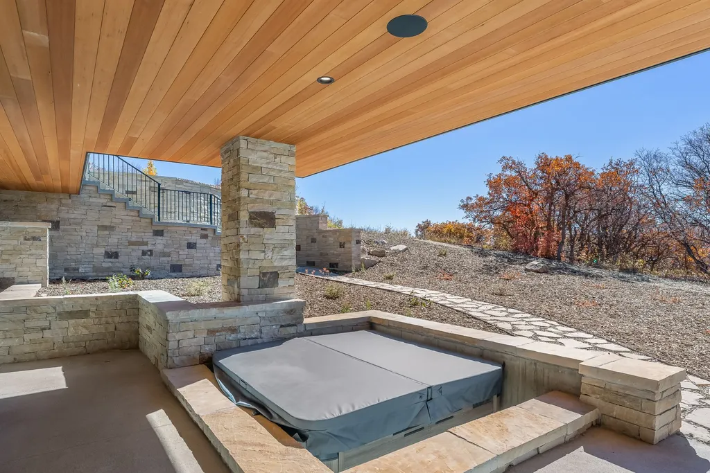2409 Preserve Drive Home in Park City, Utah. Discover this stunning 6-bedroom, 8-bathroom, 9,196 sq. ft. contemporary home in The Preserve, a premier gated community. Perched on 9.07 acres at the mountain's summit, the home offers breathtaking 280-degree views of ski areas, the Olympic Park, and Salt Lake City.