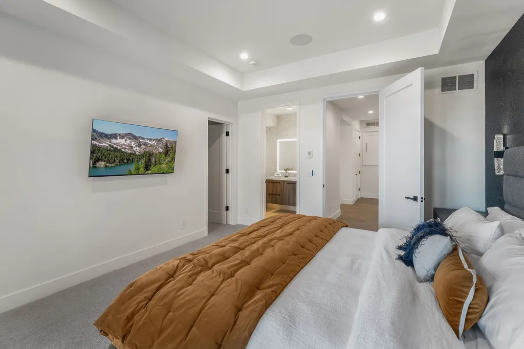 2409 Preserve Drive Home in Park City, Utah. Discover this stunning 6-bedroom, 8-bathroom, 9,196 sq. ft. contemporary home in The Preserve, a premier gated community. Perched on 9.07 acres at the mountain's summit, the home offers breathtaking 280-degree views of ski areas, the Olympic Park, and Salt Lake City.