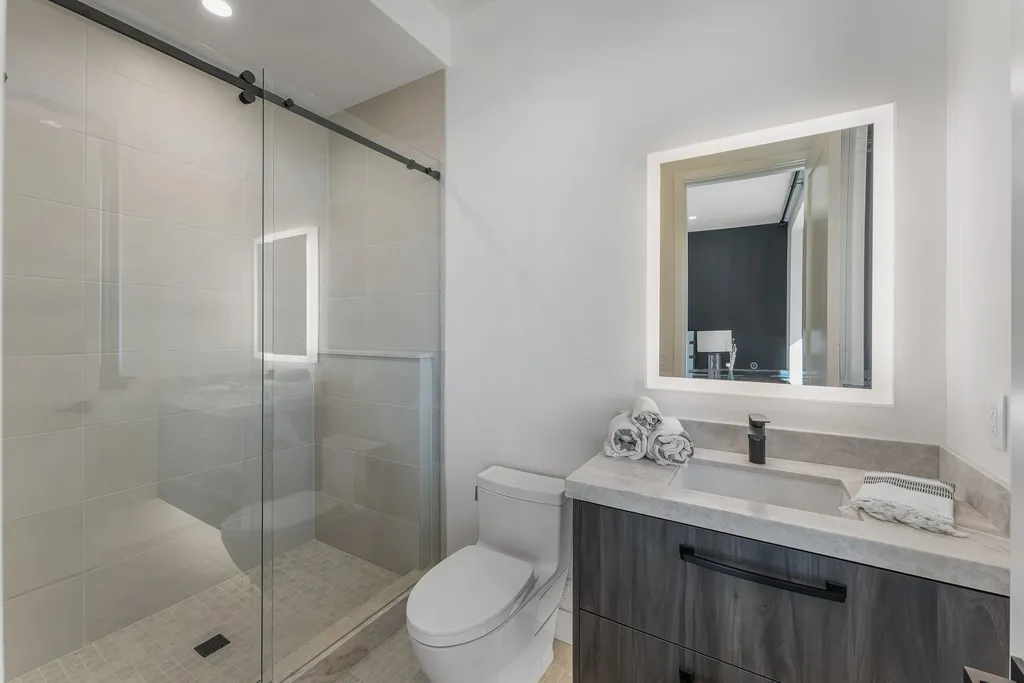 2409 Preserve Drive Home in Park City, Utah. Discover this stunning 6-bedroom, 8-bathroom, 9,196 sq. ft. contemporary home in The Preserve, a premier gated community. Perched on 9.07 acres at the mountain's summit, the home offers breathtaking 280-degree views of ski areas, the Olympic Park, and Salt Lake City.