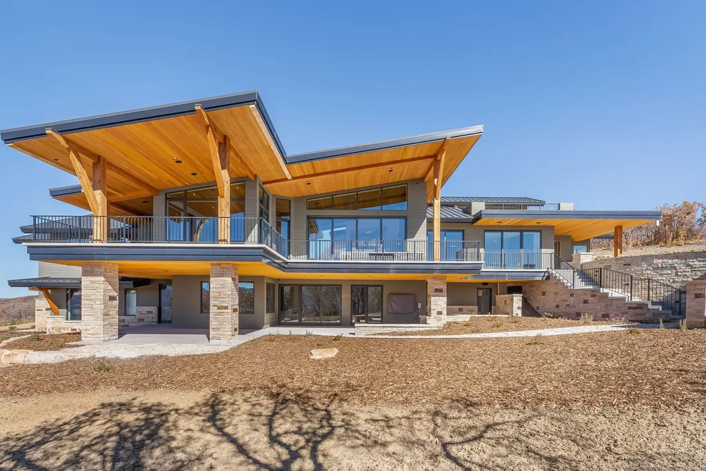 2409 Preserve Drive Home in Park City, Utah. Discover this stunning 6-bedroom, 8-bathroom, 9,196 sq. ft. contemporary home in The Preserve, a premier gated community. Perched on 9.07 acres at the mountain's summit, the home offers breathtaking 280-degree views of ski areas, the Olympic Park, and Salt Lake City.