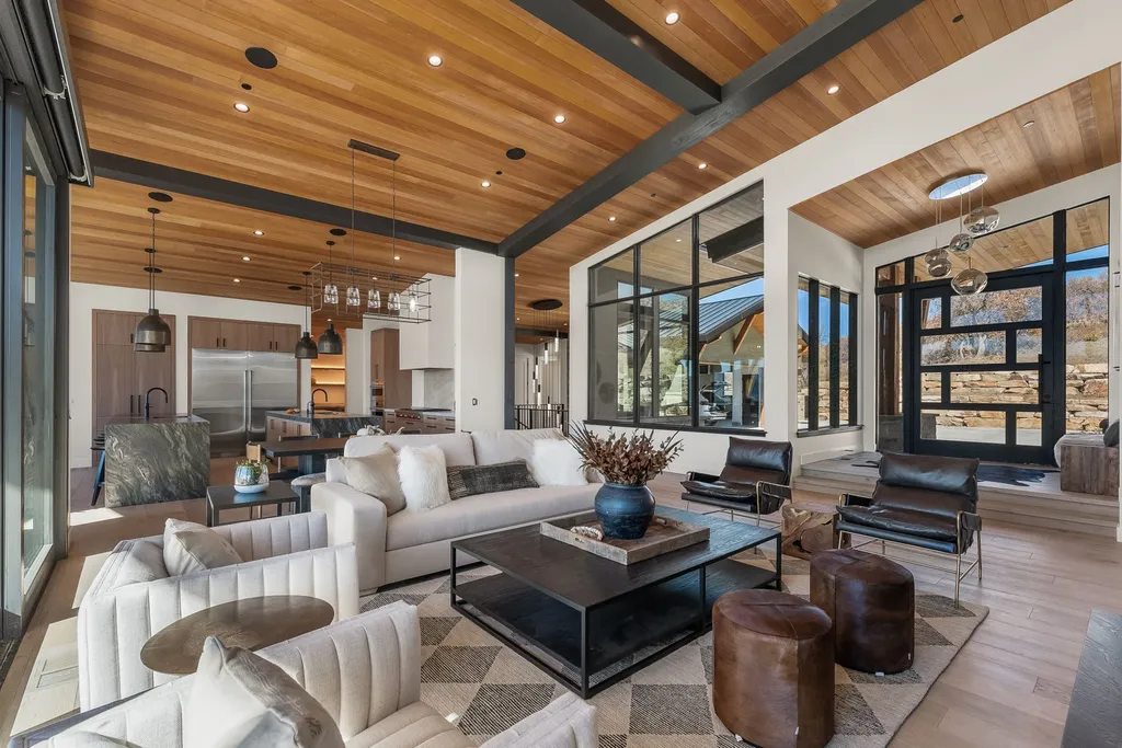 2409 Preserve Drive Home in Park City, Utah. Discover this stunning 6-bedroom, 8-bathroom, 9,196 sq. ft. contemporary home in The Preserve, a premier gated community. Perched on 9.07 acres at the mountain's summit, the home offers breathtaking 280-degree views of ski areas, the Olympic Park, and Salt Lake City.